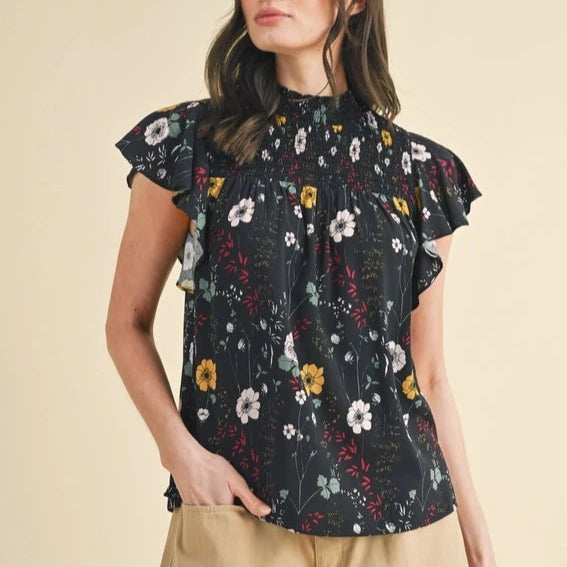 Elegant And Lazy Women's Smocked Flutter Sleeved Floral Blouse in Black